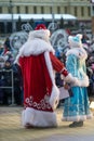 Father Frost and the Snow Maiden congratulate people merry Christmas